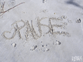 Pause geschrieben im Sand am Strand